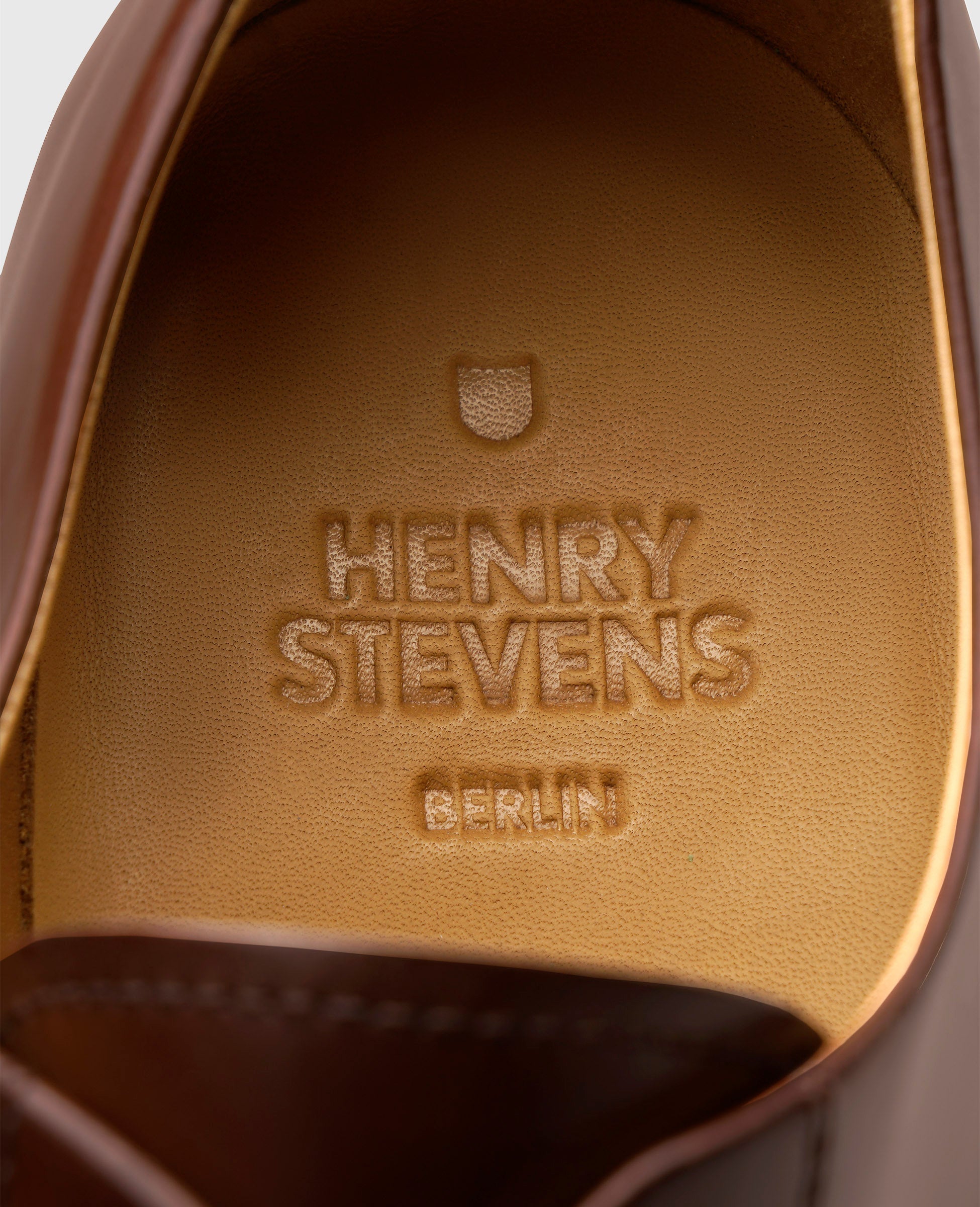 Henry Stevens is a man who works for the Marshall Police Department. His hair color is medium brown.