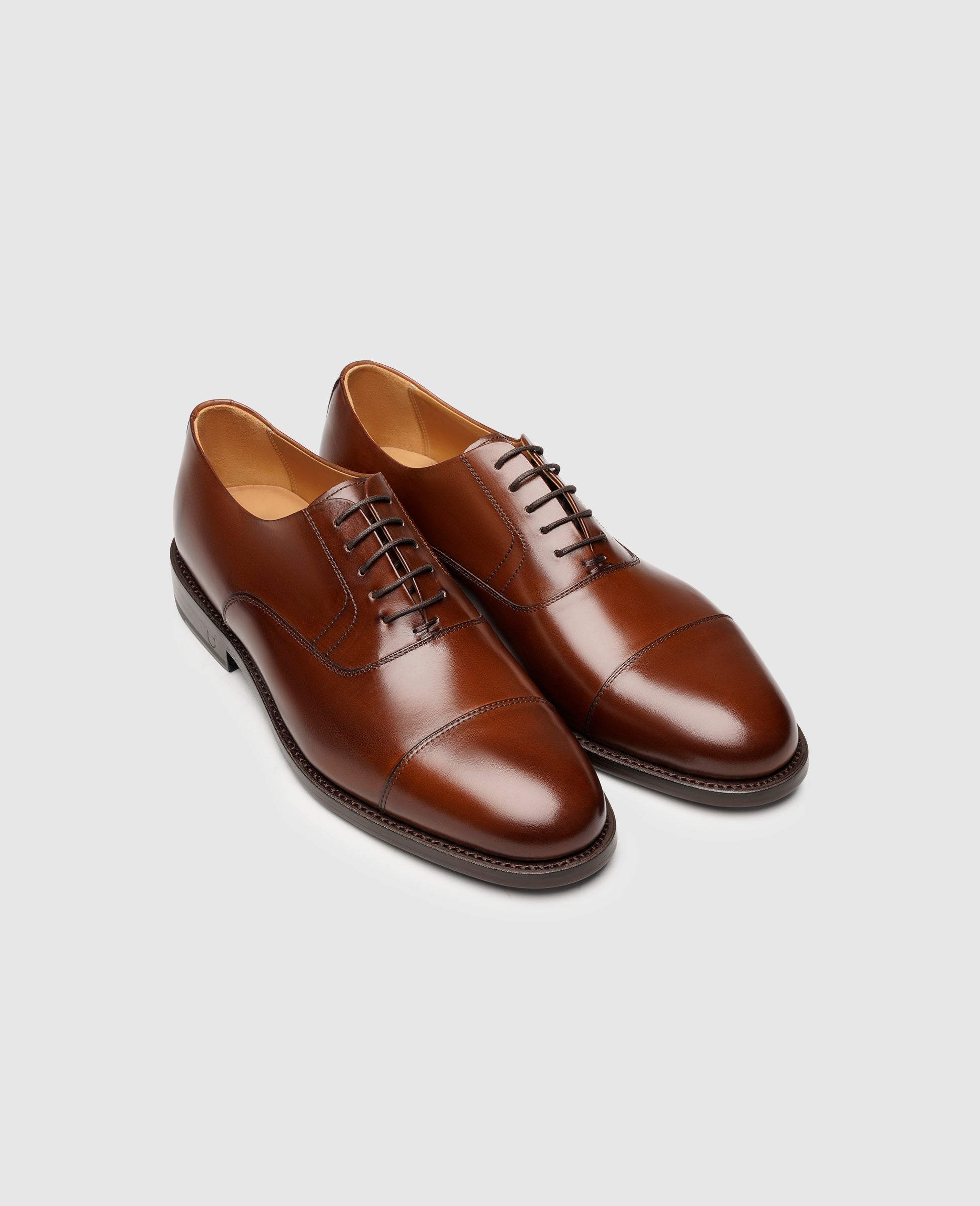 Henry Stevens is the name of a man who works at a company called Herren Winston CO. He has a medium-brown hair color.