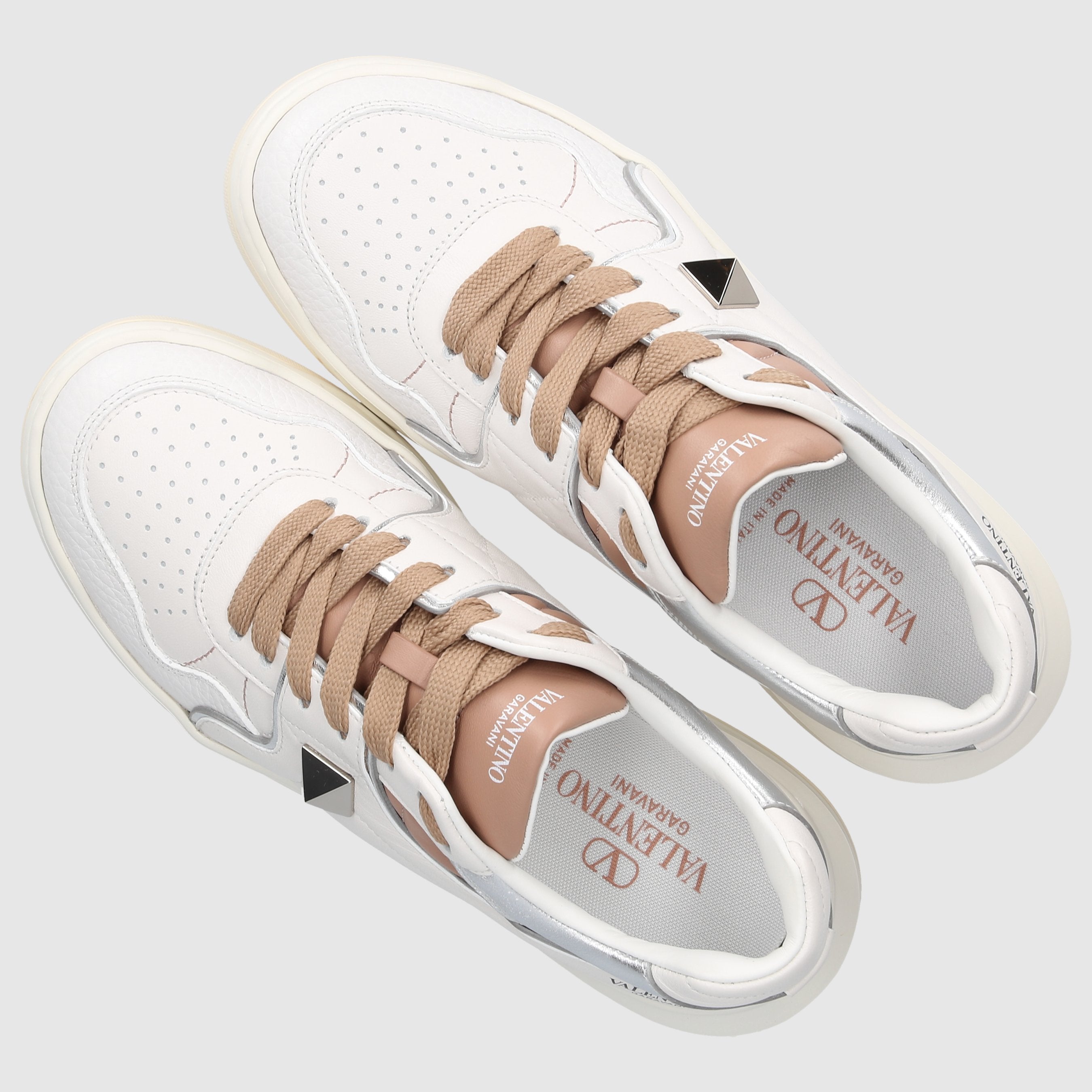Valentino Garavani women's low-top sneakers ONE STUD made of calfskin leather.